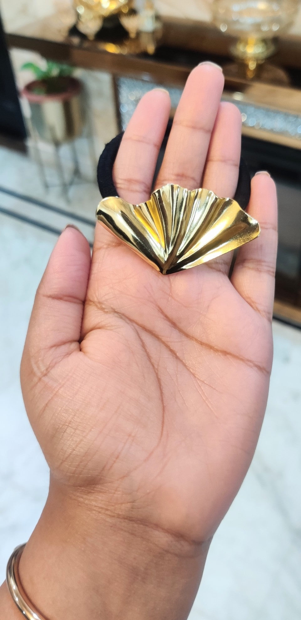 Golden muse hair tie