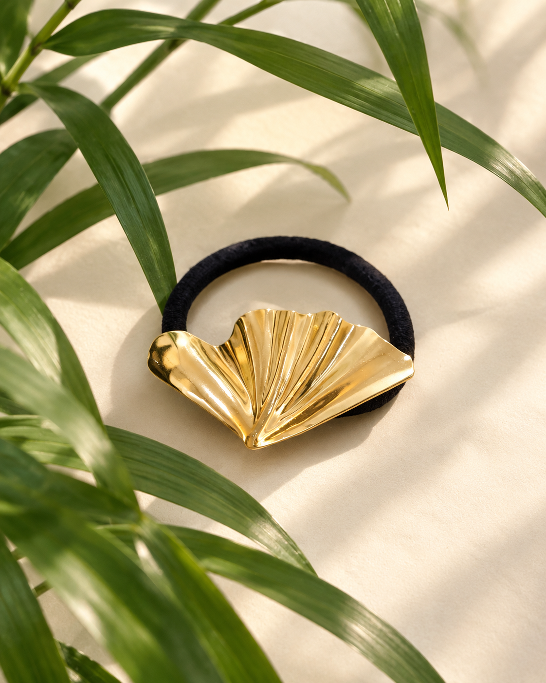 Golden muse hair tie