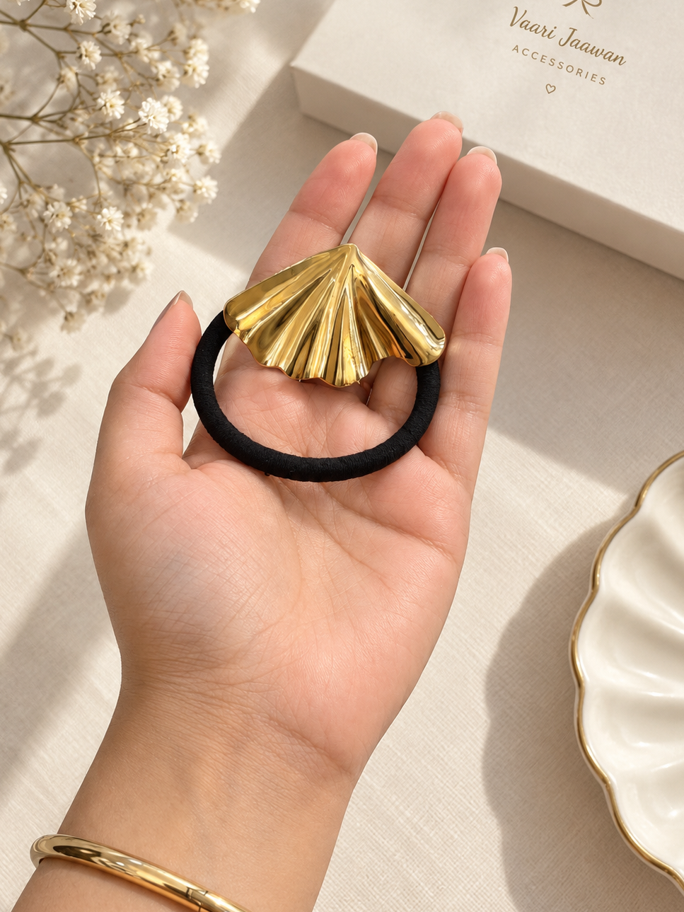Golden muse hair tie